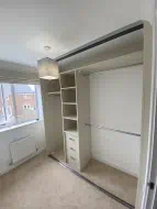 Mussel coloured interior with full length hanging, shelves and double hanging, installed in Ingleby Barwick